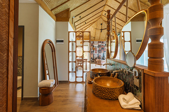 Stylish bathroom with twin basins inside a Signature Ocean Villa at ENVI Paje Zanzibar